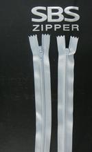 小腳鉛筆褲拉鏈的設(shè)計(jì)與服裝輔料銷售策略分析